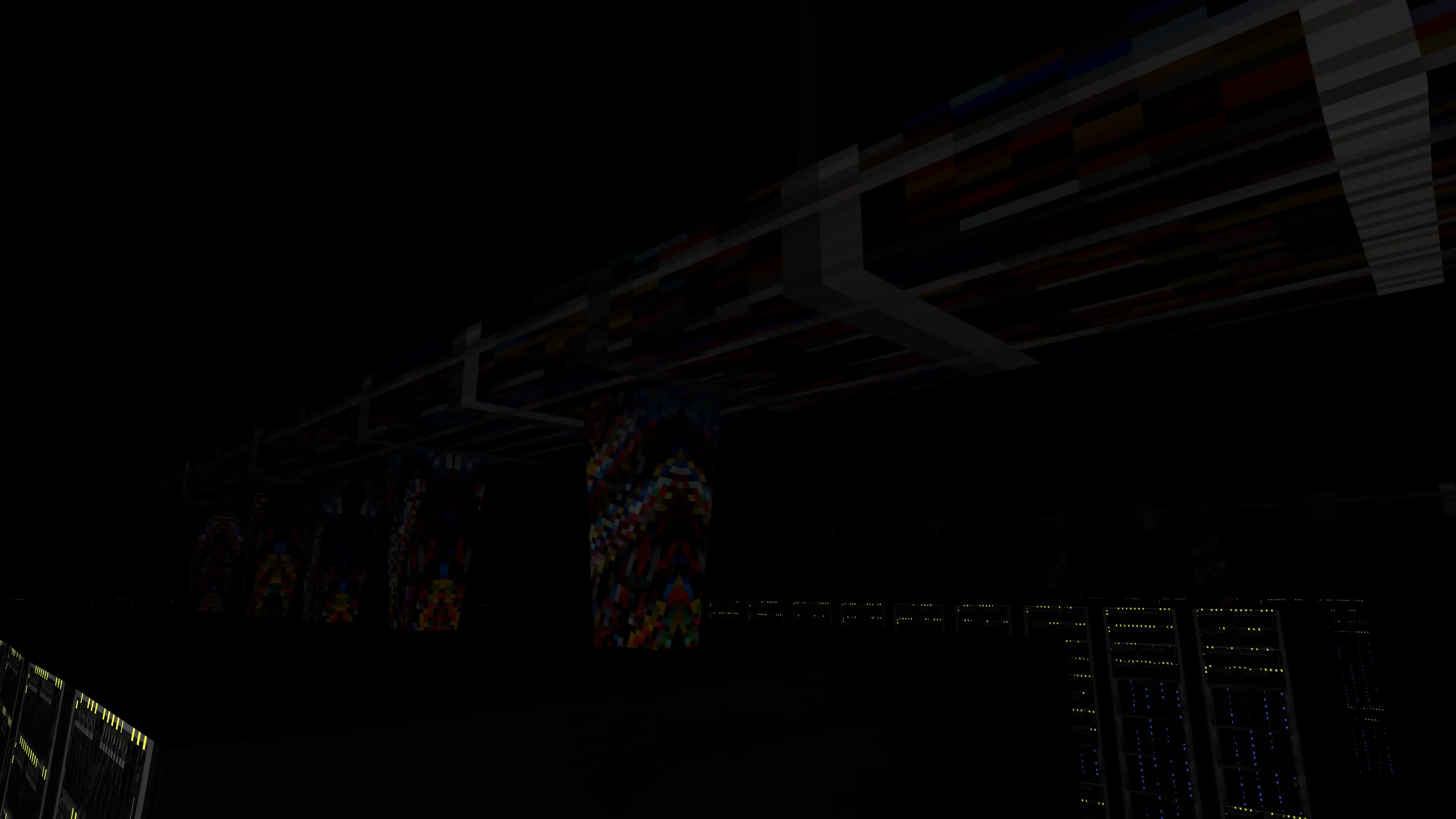 The cable bundles and overhead wiring that go into the server racks.