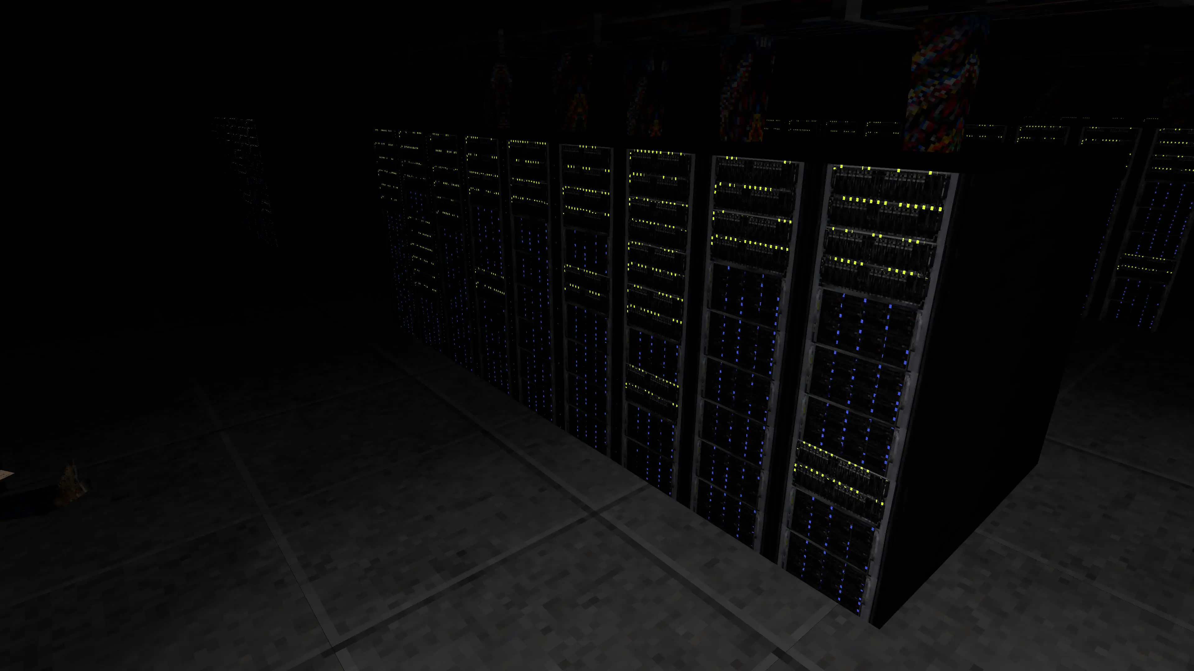A photo of one set of server racks, showing the glowing LEDs in yellow and blue.